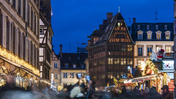 FRANCE, ALSACE, BAS-RHIN (67), STRASBOURG, CATHEDRAL SQUARE, STRASBOURG CHRISTMAS MARKET AND KAMMERZELL HOUSE AT NIGHTFRANCE, ALSACE, BAS-RHIN (67), STRASBOURG, CATHEDRAL SQUARE, STRASBOURG CHRISTMAS MARKET AND KAMMERZELL HOUSE AT NIGHT (Photo by Jean ISENMANN / ONLY FRANCE / Only France via AFP)