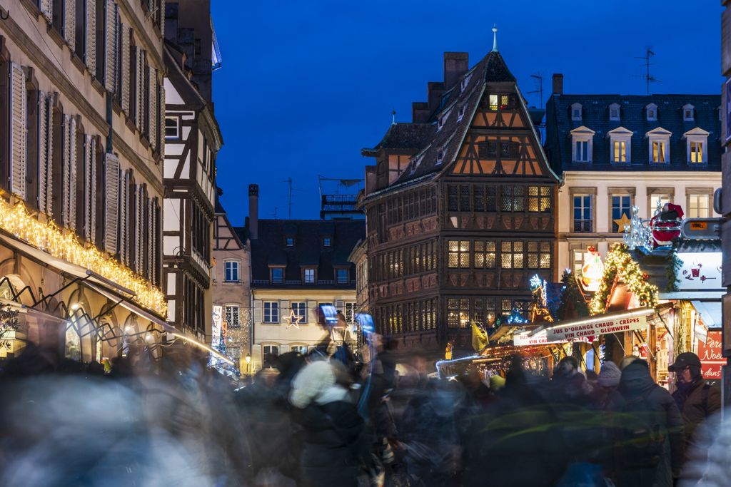 FRANCE, ALSACE, BAS-RHIN (67), STRASBOURG, CATHEDRAL SQUARE, STRASBOURG CHRISTMAS MARKET AND KAMMERZELL HOUSE AT NIGHTFRANCE, ALSACE, BAS-RHIN (67), STRASBOURG, CATHEDRAL SQUARE, STRASBOURG CHRISTMAS MARKET AND KAMMERZELL HOUSE AT NIGHT (Photo by Jean ISENMANN / ONLY FRANCE / Only France via AFP)