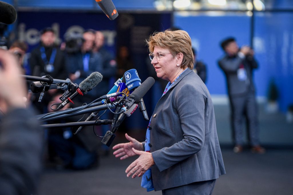 European PolitiPresident of Switzerland Viola Amherd speaks to media on her arrival for the European Political Community Summit in Budapest, on November 7, 2024. (Photo by Ferenc ISZA / AFP)cal Community summit