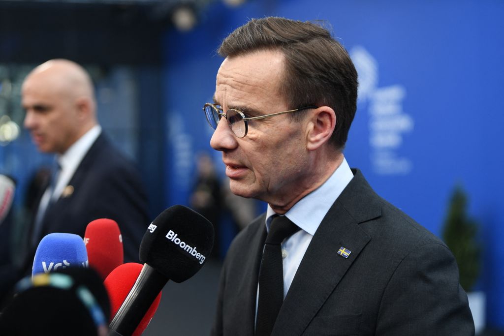 European PoliSweden's Prime Minister Ulf Kristersson speaks to media upon arrival for the European Political Community Summit in Budapest, on November 7, 2024. (Photo by Ferenc ISZA / AFP)tical Community summit