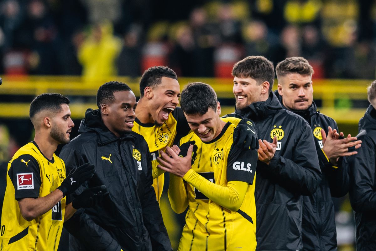 Borussia Dortmund v Sport-Club Freiburg - Bundesliga
Giovanni Reyna and Felix Nmecha of Borussia Dortmund celebrate with teammates and fans after the Bundesliga soccer match between Borussia Dortmund and Sport-Club Freiburg at Signal Iduna Park in Dortmund, Germany, on November 23, 2024. (Photo by Hesham Elsherif/NurPhoto) (Photo by Hesham Elsherif / NurPhoto / NurPhoto via AFP)