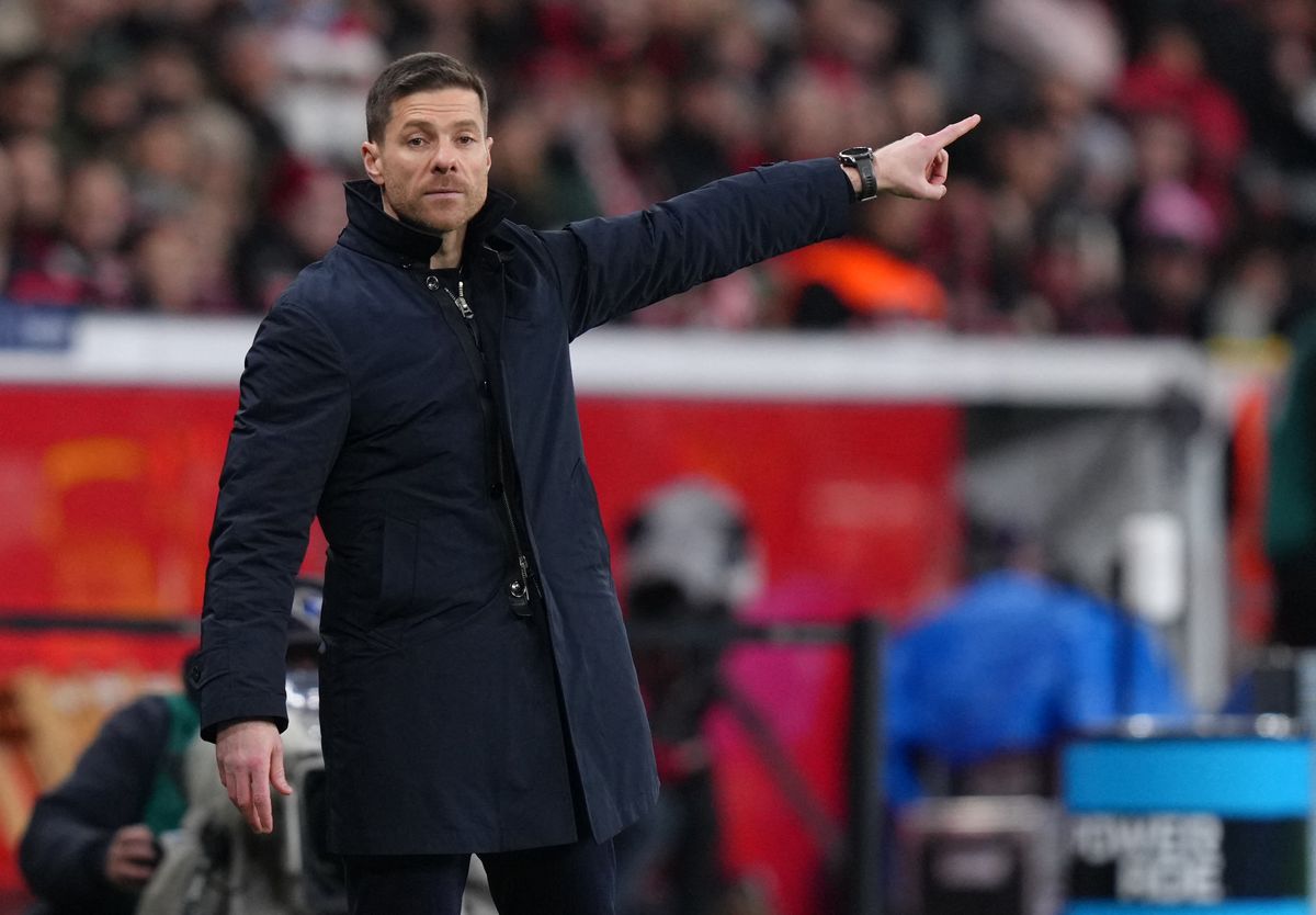 AFP or licensors/Bayer Leverkusen Spanish head coach Xabi Alonso gestures during the German first division Bundesliga football match between Bayer Leverkusen and SC Freiburg in Leverkusen on December 21, 2024. (Photo by Pau BARRENA / AFP) / 