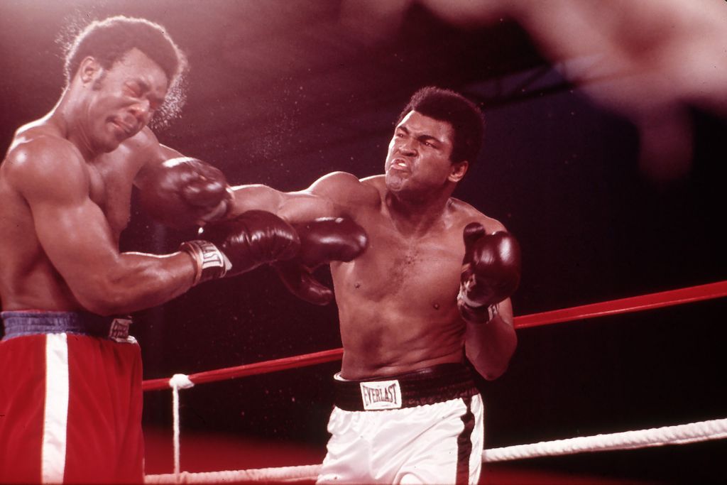 Kinshasa, Zaire - 1974: (L-R) George Foreman (left) and Muhammad Ali boxing at Zaire Stade du 20 Mai, The Rumble in the Jungle, October 30, 1974. (Photo by Ken Regan /Disney General Entertainment Content via Getty Images)