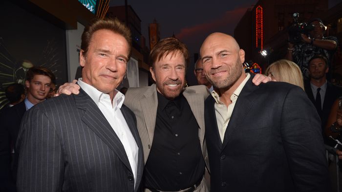 HOLLYWOOD, CA - AUGUST 15:  Actors Arnold Schwarzenegger, Chuck Norris and Randy Couture arrive at "The Expendables 2" Los Angeles Premiere at Grauman's Chinese Theatre on August 15, 2012 in Hollywood, California.  (Photo by Lester Cohen/WireImage)