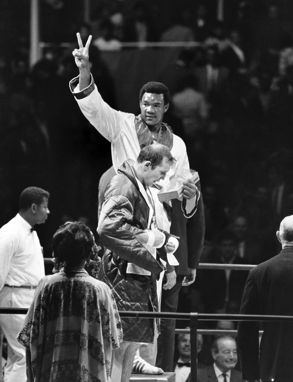 Mexico City, Mexico - 1968: (L-R) George Foreman, Jonas Cepulis at medal ceremony 1968 Olympics at Arena Mexico. (Photo by Disney General Entertainment Content via Getty Images)