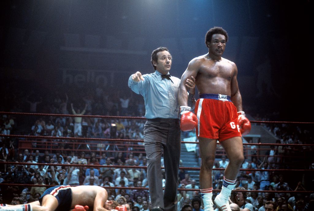 UTICA,NY - AUGUST 14,1976: George Foreman walks to his corner after knocking out Scott LeDoux during the fight at the Utica Memorial Auditorium in Utica, New York. George Foreman won by a TKO 3. (Photo by: The Ring Magazine via Getty Images)