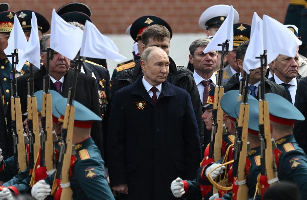 In this pool photograph distributed by the Russian state agency Sputnik, Russia's President Vladimir Putin and foreign leaders lay flowers at the Tomb of the Unknown Soldier by the Kremlin wall after the Victory Day military parade in central Moscow on May 9, 2024. Russia celebrates the 79th anniversary of the victory over Nazi Germany in World War II. (Photo by Maksim BLINOV / POOL / AFP)
