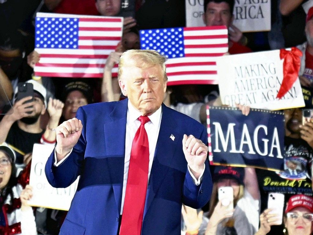 U.S. President Donald Trump appears during a rally at Warren, suburb of Detroit, Michigan, United States of America on April 29, 2025. U.S. President Trump gave a speech to mark 100 days since his second term in office, touting the success of his economic policies.     ( The Yomiuri Shimbun ) (Photo by Takayuki Fuchigami / Yomiuri / The Yomiuri Shimbun via AFP)