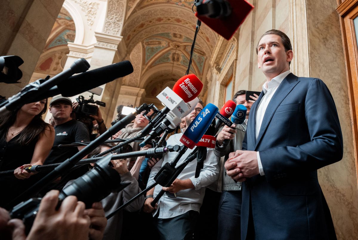 Austria's former Chancellor Sebastian Kurz addresses journalists as he leaves the court after the hearing of his appeal against his conviction for giving false testimony, on May 26, 2025 in Vienna, Austria. The Vienna Court of Appeal overturned Kurz's conviction for giving false testimony. Once hailed as the "wunderkind" of Europe's conservatives, Kurz resigned as chancellor in 2021 amid a series of accusations. He was found guilty in 2024 of giving false testimony to a parliamentary inquiry and handed an eight-month suspended jail sentence. (Photo by GEORG HOCHMUTH / APA / AFP) / Austria OUT