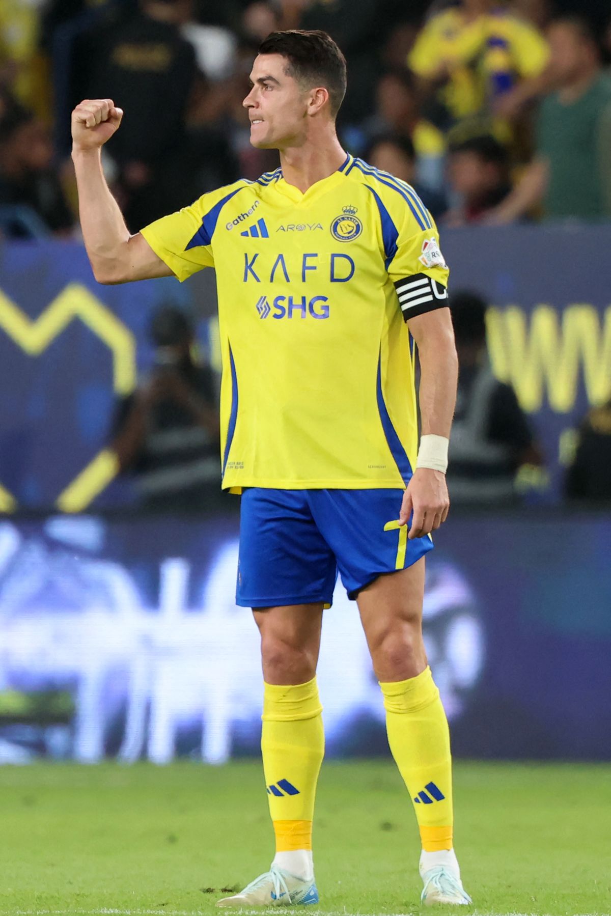 Nassr's Portuguese forward #7 Cristiano Ronaldo celebrates after scoring his team's first goal during the Saudi Pro League football match between Al-Nassr and Al-Riyadh at Al-Awwal Park in Riyadh on April 12, 2025. (Photo by Fayez NURELDINE / AFP)