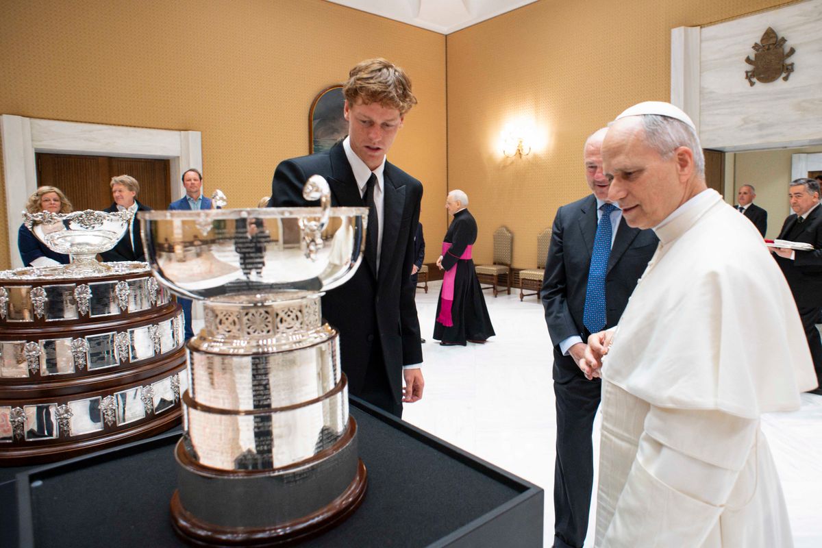This photo taken and handout on May 14, 2025 by The Vatican Media shows Pope Leo XIV during a private audience with Italy's tennis player Jannik Sinner, in The Vatican. (Photo by Handout / VATICAN MEDIA / AFP) / RESTRICTED TO EDITORIAL USE - MANDATORY CREDIT "AFP PHOTO / VATICAN MEDIA" - NO MARKETING - NO ADVERTISING CAMPAIGNS - DISTRIBUTED AS A SERVICE TO CLIENTS
