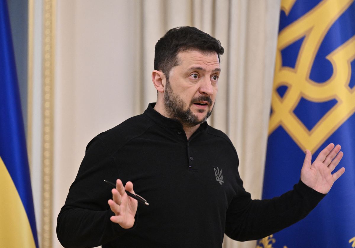 Ukrainian President Volodymyr Zelensky gestures as he speaks to journalists during his press conference in Kyiv on March 28, 2025, amid the Russian invasion of Ukraine. (Photo by Genya SAVILOV / AFP)
