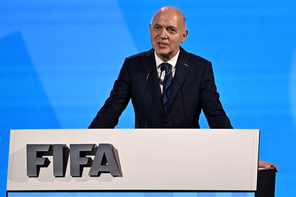 German Football Association President Bernd Neuendorf makes a speech in favour of the joint Germany-Netherlands-Belgium bid to host the 2027 Women's World Cup during the 74th FIFA Congress in Bangkok on May 17, 2024. The 74th FIFA Congress is taking place in Bangkok with member associations voting on a range of issues including confirmation of the host nation or nations for the 2027 women's football World Cup. (Photo by Manan VATSYAYANA / AFP)