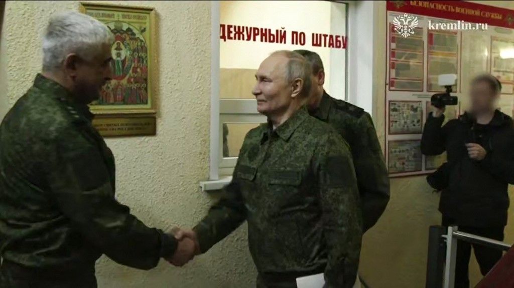 In this grab taken from a handout footage released by the Kremlin on March 12, 2025, Russia's President Vladimir Putin visits a command point for the Kursk group of troops involved in the counteroffensive in the Kursk region, amid the ongoing Russian-Ukrainian conflict. (Photo by Handout / KREMLIN.RU / AFP) / RESTRICTED TO EDITORIAL USE - MANDATORY CREDIT "AFP PHOTO / Kremlin.ru / handout" - NO MARKETING NO ADVERTISING CAMPAIGNS - DISTRIBUTED AS A SERVICE TO CLIENTS