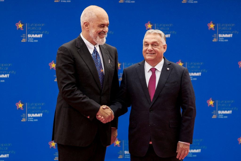 Albania's Prime Minister Edi Rama (L) welcomes Hungary's Prime Minister Viktor Orban (R) ahead of the European Political Community (EPC) summit, in Tirana on May 16, 2025. (Photo by Ludovic MARIN / AFP)