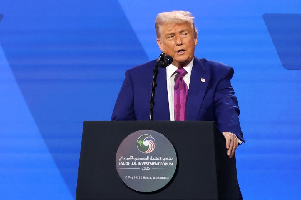 US President Donald Trump speaks during the Saudi-US investment forum at the King Abdul Aziz International Conference Center in Riyadh on May 13, 2025. Saudi Arabia on May 13 promised billions of dollars in deals with the United States from defence to artificial intelligence as it threw a lavish welcome for President Donald Trump on the first state visit of his second term. (Photo by Fayez NURELDINE / AFP)