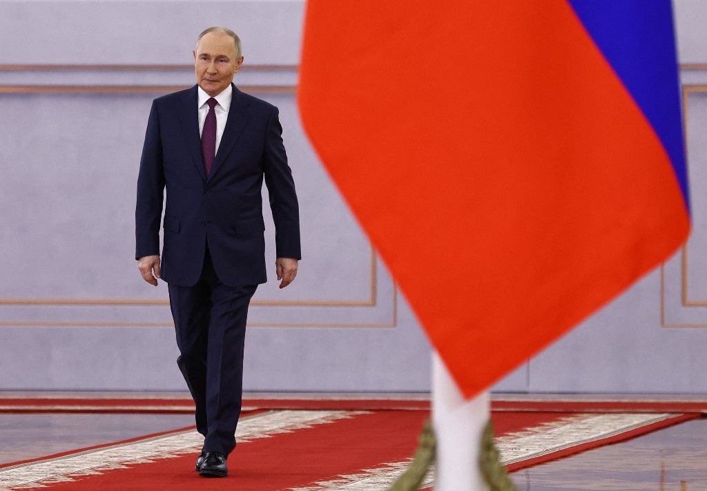 Russian President Vladimir Putin attends a ceremony to welcome his Chinese counterpart before their talks at the Kremlin in Moscow on May 8, 2025. (Photo by Evgenia Novozhenina / POOL / AFP)
