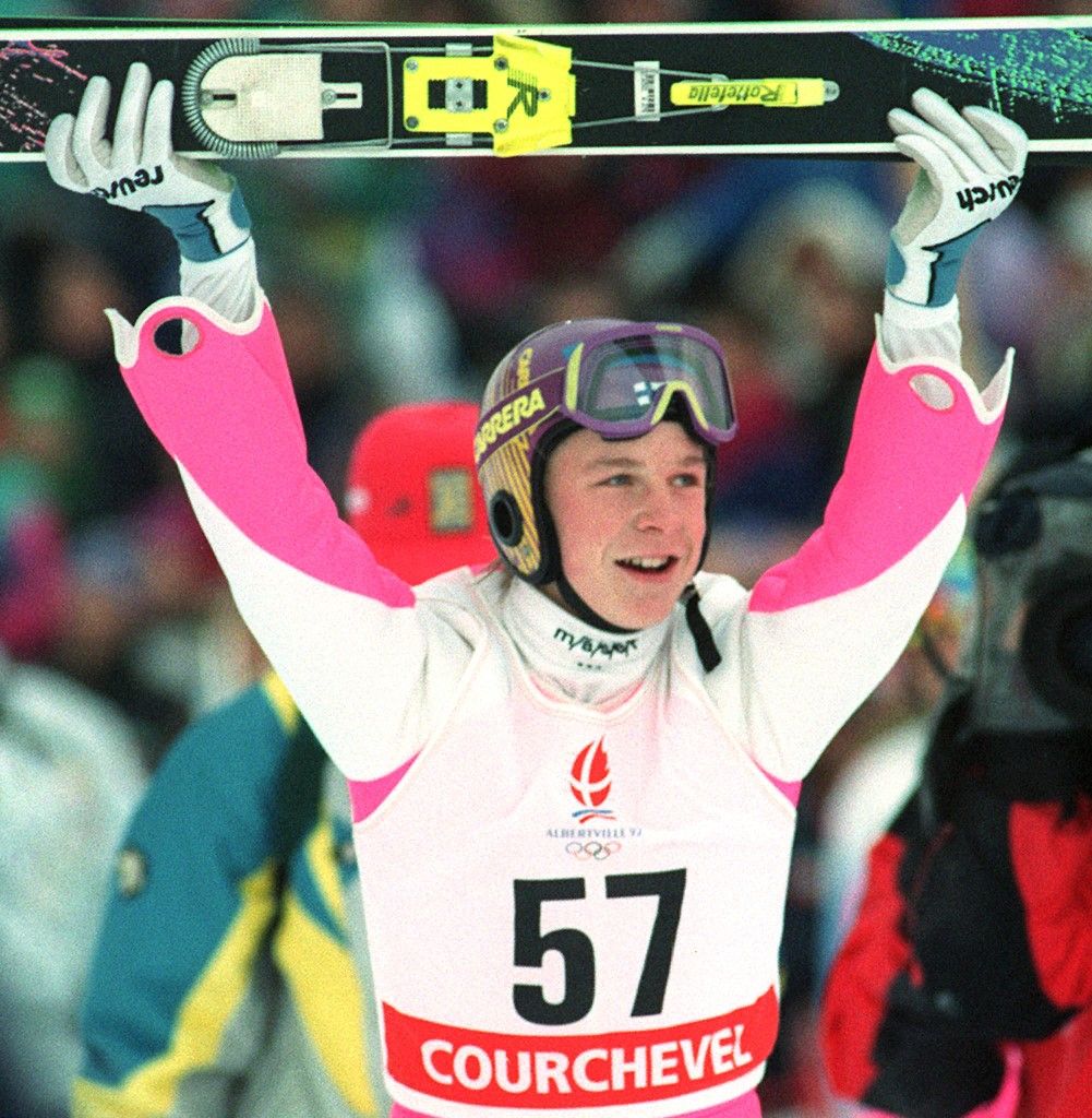 Finnish Toni Nieminen holds his skis up as he celebrates his victory in the 120m ski jump competition at the Winter Olympic Games 16 February 1992 in Courchevel, near Albertville. Nieminen, 16 years old, became the youngest man ever to win an Olympic gold medal in an individual event. Nieminen won in front of Austrians Martin Höllwarth (silver) and Heinz Kuttin (bronze). (Photo by ROBERT SULLIVAN / AFP)