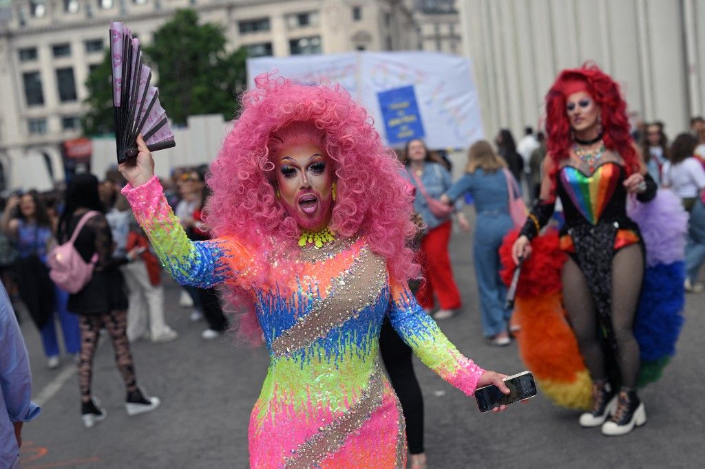 People take part in the LGBTQI Pride in Brussels on May 17, 2025. (Photo by Nicolas TUCAT / AFP)