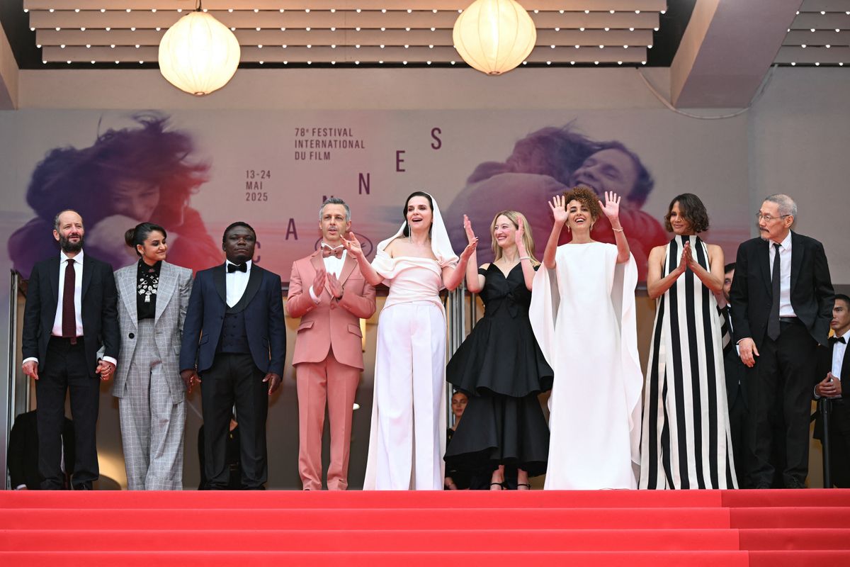 Mexican filmmaker and member of the jury of the 78th cannes film festival Carlos Reygadas, Indian filmmaker and member of the jury of the 78th cannes film festival Payal Kapadia, Congolese filmmaker and member of the jury of the 78th cannes film festival Dieudo Hamadi, US actor and member of the jury of the 78th cannes film festival Jeremy Strong, French actress and president of the jury of the 78th cannes film festival Juliette Binoche, Italian actress and member of the jury of the 78th cannes film festival Alba Rohrwacher, French-Moroccan writer and journalist and member of the jury of the 78th cannes film festival Leila Slimani, US actress and member of the jury of the 78th cannes film festival Halle Berry and South korean filmmaker and member of the jury of the 78th cannes film festival Hong Sang-Soo arrive for the Opening Ceremony and the screening of the film "Partir un Jour" (Bye Bye) presented out of competition at the 78th edition of the Cannes Film Festival in Cannes, southern France, on May 13, 2025. (Photo by Bertrand GUAY / AFP)