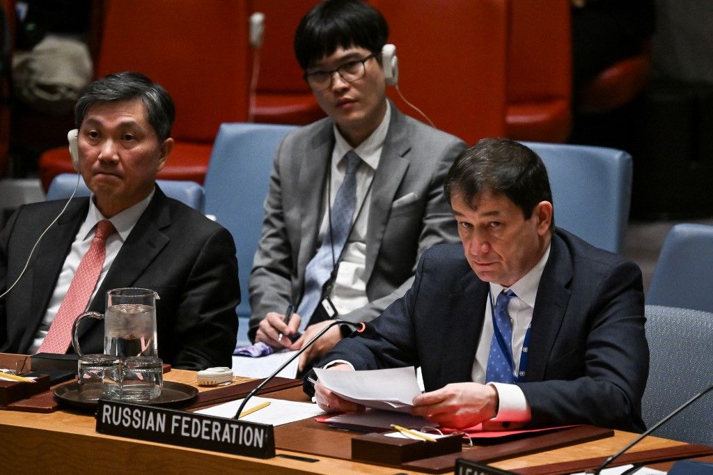 Russian Deputy Ambassador to the UN Dmitry Polyansky (R) speaks during United Nations Security Council meeting on Gaza and the Middle East, at UN headquarters in New York City on March 18, 2025. (Photo by ANGELA WEISS / AFP)