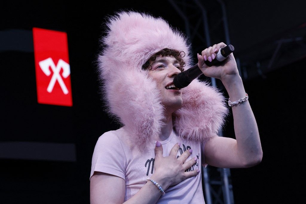 Swiss singer Nemo Mettler, also known as Nemo, winner of the 68th Eurovision Song Contest (ESC) 2024 with the song "The Code" performs during a welcome event at his hometown in Biel on June 17, 2024. (Photo by STEFAN WERMUTH / AFP)