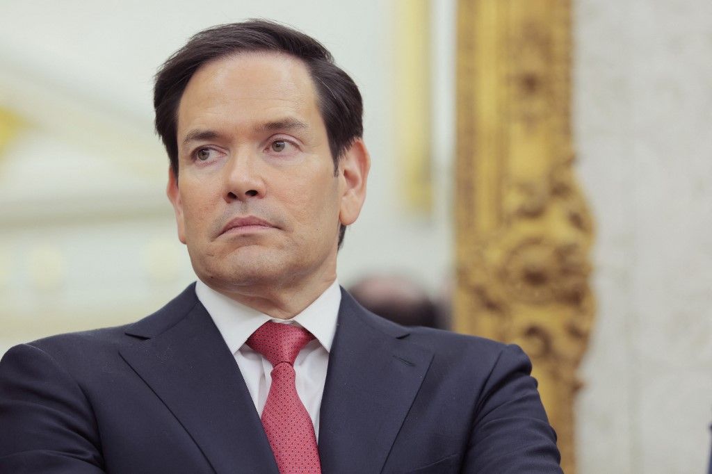 WASHINGTON, DC - MAY 06: U.S. Secretary of State Marco Rubio listens as U.S. President Donald Trump speaks during a swearing-in ceremony for Special Envoy to the Middle East Steve Witkoff in the Oval Office at the White House on May 06, 2025 in Washington, DC. U.S. President Donald Trump provided an update on the Houthi conflict in the Middle East. Anna Moneymaker/Getty Images/AFP (Photo by Anna Moneymaker / GETTY IMAGES NORTH AMERICA / Getty Images via AFP)