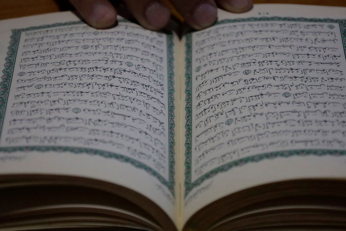 The Sheikh of the Muslim community in a mosque in Mexico City, Mexico, on March 1, 2025, reads the Quran before breaking the fast at the beginning of Ramadan to grow spiritually and establish stronger relationships with Allah. (Photo by Gerardo Vieyra/NurPhoto) (Photo by Gerardo Vieyra / NurPhoto / NurPhoto via AFP)