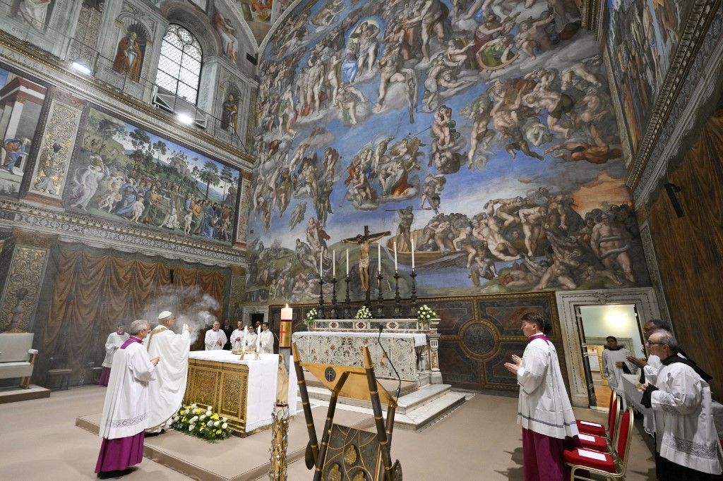 This photo taken and handout on May 9, 2025 by The Vatican Media shows Pope Leo XIV during a mass with cardinals in the Sistine Chapel in The Vatican. (Photo by Handout / VATICAN MEDIA / AFP) / RESTRICTED TO EDITORIAL USE - MANDATORY CREDIT "AFP PHOTO / VATICAN MEDIA" - NO MARKETING - NO ADVERTISING CAMPAIGNS - DISTRIBUTED AS A SERVICE TO CLIENTS