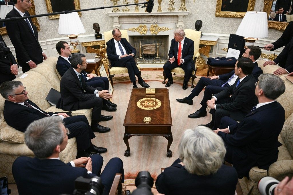 US President Donald Trump and German Chancellor Friedrich Merz meet during a bilateral meeting in the Oval Office of the White House in Washington, DC, on June 5, 2025. A month into his job, the conservative Merz, 69, will try to build a rapport with the mercurial Trump as he seeks to maintain good ties with the country he considers post-war Germany's "indispensable" ally. (Photo by Brendan SMIALOWSKI / AFP)