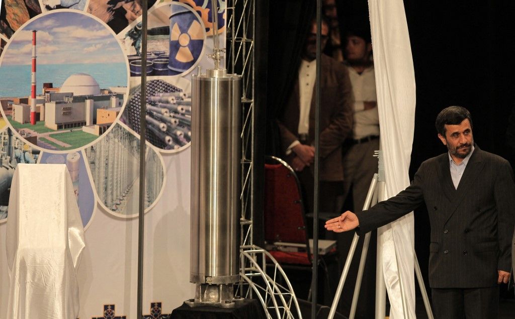 CORRECTING DATE IN CAPTION
Iranian President Mahmoud Ahmadinejad unveils a sample of the third generation centrifuge for uranium enrichment during a ceremony to mark the National Nuclear Day day in Tehran on April 9, 2010. Ahmadinejad said that any threats from the West against Iran will meet with more determination and reiterated that his government was not seeking an "inhuman" atomic bomb. The hardline president, whose comments came a day after China joined five other major powers in agreeing to further talks on a new round of UN sanctions against Iran over its nuclear programme, gave instructions on February 7 for the Islamic republic to begin enriching uranium to the 20 percent level required for a Tehran medical research reactor after long-running talks on a deal for the major powers to supply the fuel failed to bear fruit.  AFP PHOTO/Behrouz MEHRI (Photo by BEHROUZ MEHRI / AFP)