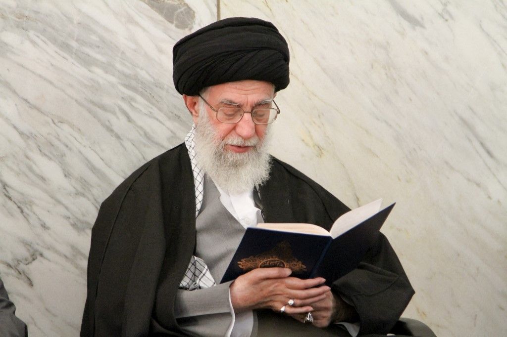 Portrait of Iran's Supreme Leader Ali Khamenei in the funeral ceremony held for the then-president Hassan Rouhani's mother in Tehran, Iran, on March 25, 2025. (Photo by Mohammadali Najib / Middle East Images via AFP)