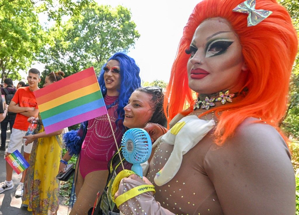 People take part in the LGBTQ+ (lesbian, gay, bisexual, transgender, queer and others) Pride Parade in Budapest, Hungary, on July 15, 2023 in memory of the Stonewall Riots, the first big uprising of homosexuals against police assaults in New York City on June 27, 1969. (Photo by ATTILA KISBENEDEK / AFP)