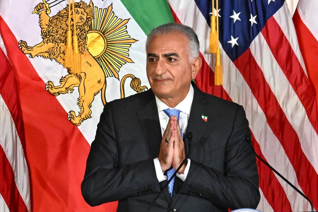 Reza Pahlavi, activist, advocate and oldest son of the last Shah of Iran, gestures as he receives the Richard Nixon Foundations Architect of Peace Award at the Richard Nixon Presidential Library and Museum in Yorba Linda, California, on October 22, 2024. (Photo by Patrick T. Fallon / AFP)