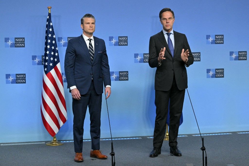 NATO Secretary General Mark Rutte and US Secretary of Defence Pete Hegseth deliver remarks before a Defence Ministers meeting at the NATO headquarters, in Brussels, on June 5, 2025. (Photo by NICOLAS TUCAT / AFP)