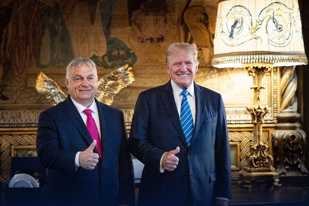 This handout from the social media platform X (formerly Twitter) account of Hungary's Prime Minister Viktor Orban @PM_ViktorOrban posted on July 11, 2024 shows Orban (L) posing with former US president Donald Trump at Trump's estate in Mar-a-Lago in Palm Beach, Florida. Hungary's nationalist Prime Minister Viktor Orban jetted off to Florida on July 11 to meet with former US president Donald Trump after the end of the NATO summit in Washington. (Photo by Handout / X ACCOUNT OF HUNGARY'S PRIME MINISTER VIKTOR ORBAN @PM_ViktorOrban / AFP) / -----EDITORS NOTE --- RESTRICTED TO EDITORIAL USE - MANDATORY CREDIT "AFP PHOTO / X ACCOUNT OF HUNGARY'S PRIME MINISTER VIKTOR ORBAN @PM_ViktorOrban" - NO MARKETING - NO ADVERTISING CAMPAIGNS - DISTRIBUTED AS A SERVICE TO CLIENTS