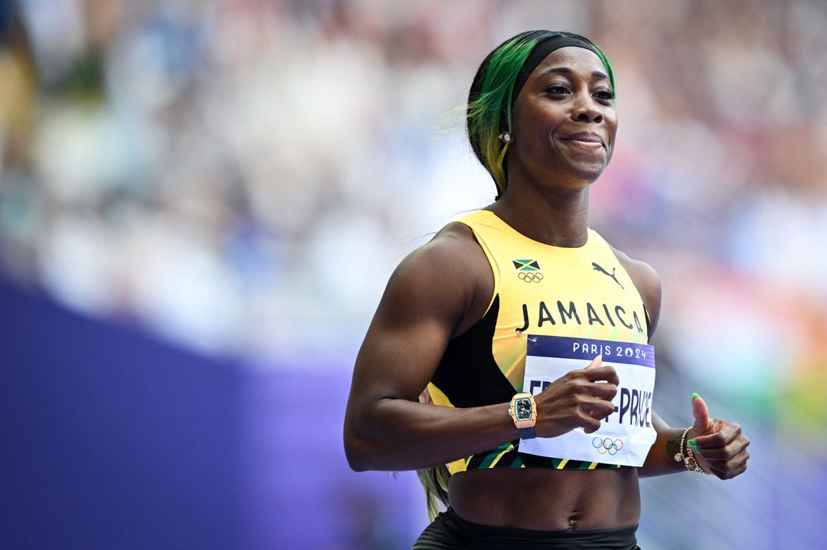 Jamaica's Shelly-Ann Fraser-Pryce competes in the women's 100m heat of the athletics event at the Paris 2024 Olympic Games at Stade de France in Saint-Denis, north of Paris, on August 2, 2024. (Photo by Andrej ISAKOVIC / AFP)