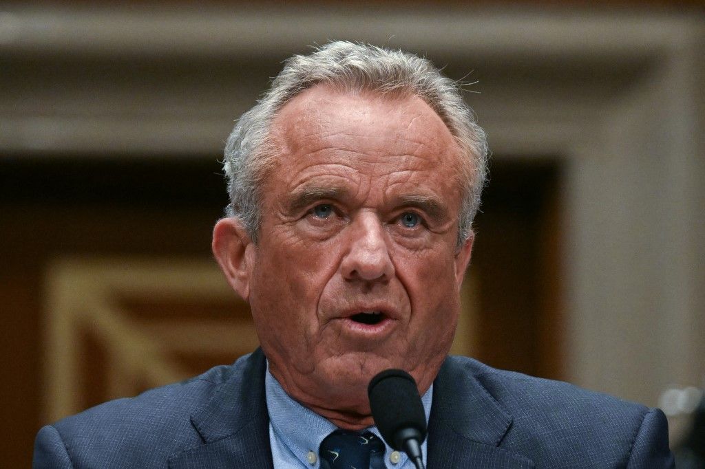 (FILES) US Secretary of Health and Human Services Robert F. Kennedy Jr., testifies before a Senate Committee on Health, Education, Labor, and Pensions hearing on the Presidents proposed budget request for fiscal year 2026 for the Department of Health and Human Services, on Capitol Hill in Washington, DC, May 14, 2025. US Health Secretary Robert F. Kennedy Jr. on June 9 announced he was dismissing all current members of a key federal vaccine advisory panel, accusing them of conflicts of interest -- his latest salvo against the nation's immunization policies. (Photo by Jim WATSON / AFP)