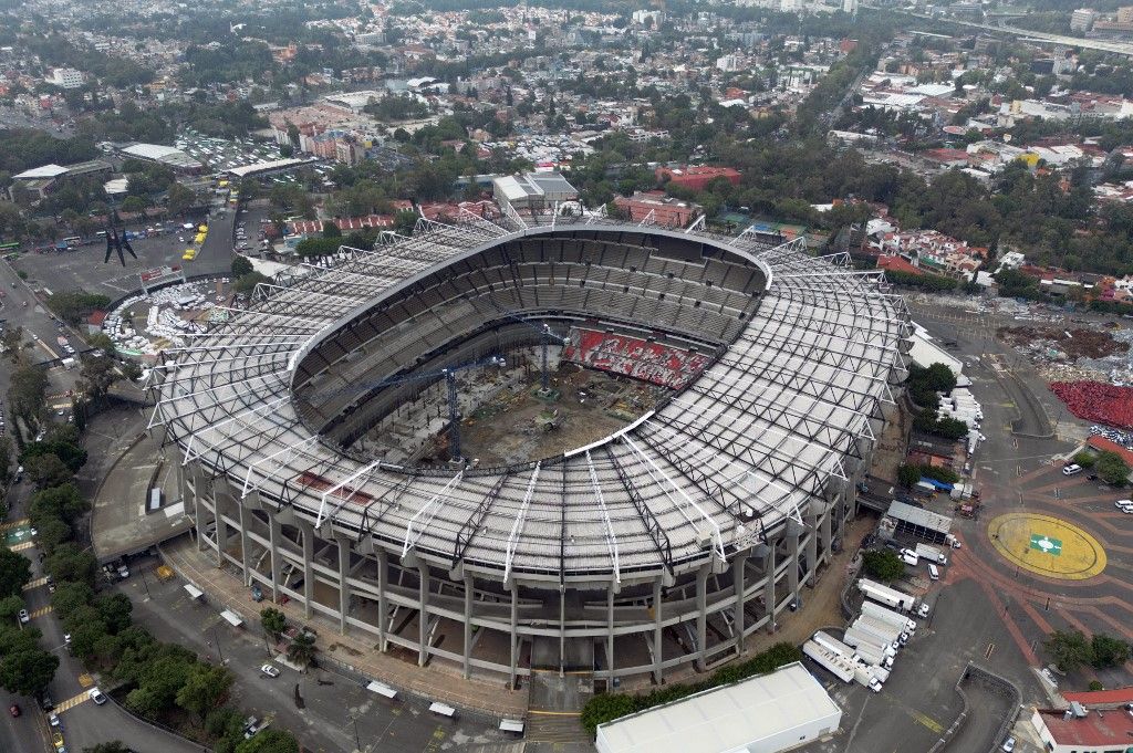 This aerial view shows the Banorte Stadium (formerly known as Azteca Stadium) during its renovation work for the 2026 World Cup in Mexico City on June 2, 2025. Whenever the history of the World Cup is told, a separate chapter must be reserved for the monumental Azteca Stadium, which, a year away from hosting the World Cup for the third time, stands wrapped in enchantment. (Photo by Alfredo ESTRELLA / AFP)