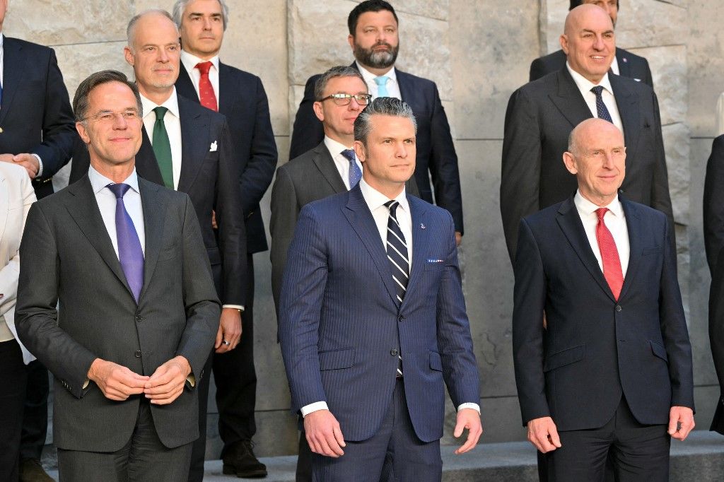(LtoR) NATO Secretary General Mark Rutte, US Secretary of Defence Pete Hegseth and Britain's Defence Secretary John Healey pose during a family picture on the sidelines of a NATO Defence Ministers meeting at the NATO headquarters, in Brussels, on June 5, 2025. (Photo by NICOLAS TUCAT / AFP)