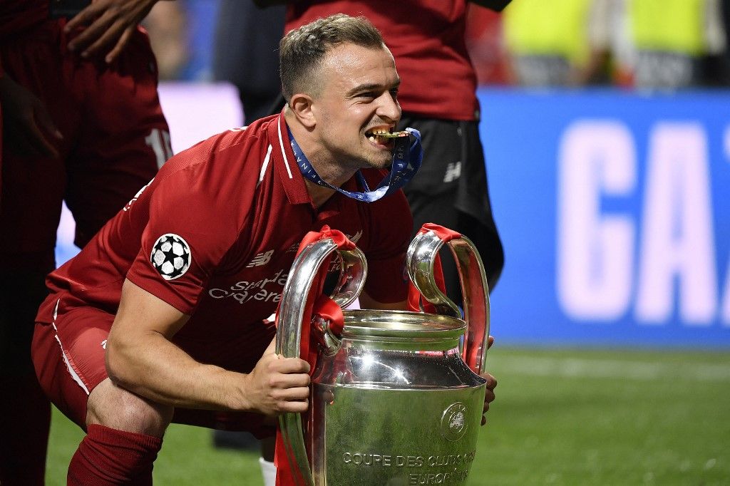 Xherdan Shaqiri, svájci válogatott, Liverpool, Xherdan Shaqiri of Liverpool FC poses with the trophy and celebrates the victory at the end of the 2019 UEFA Champions League Final match between Tottenham Hotspur and Liverpool at Wanda Metropolitano Stadium, Madrid, Spain on 1 June 2019. (Photo by Giuseppe Maffia/NurPhoto) (Photo by Giuseppe Maffia / NurPhoto via AFP)