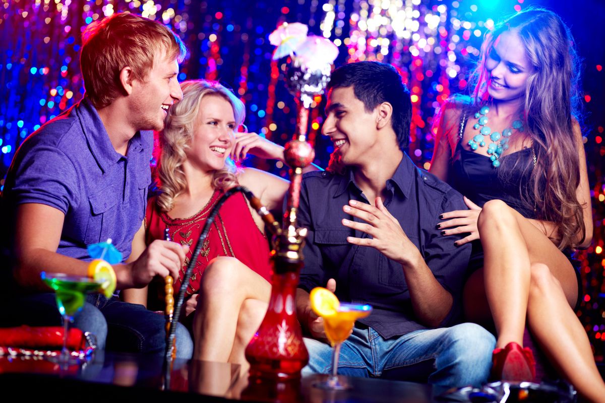 Friends in hookah room