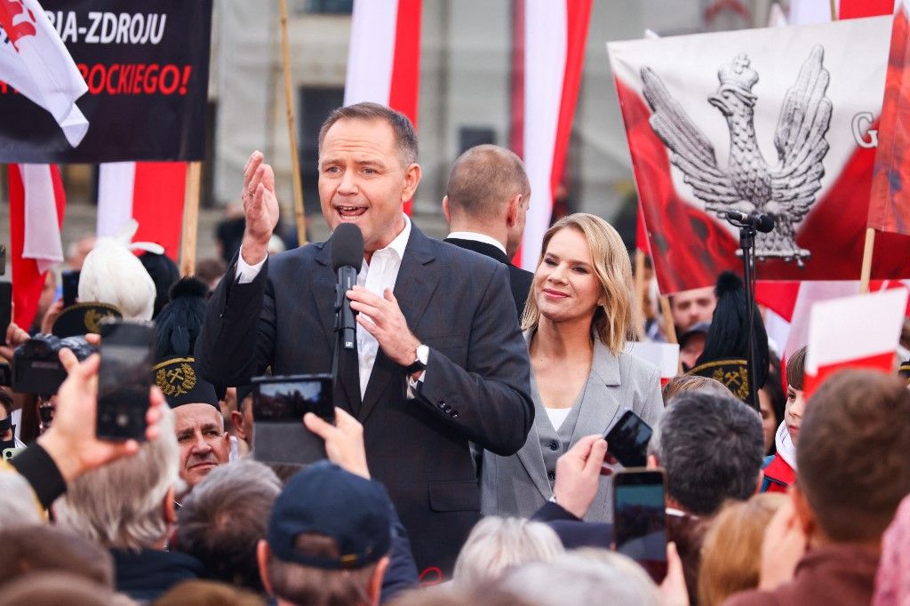 Karol Nawrocki, presidential candidate supported by the Law and Justice party, and his wife Marta Nawrocka, attend a campaign rally on May 29, 2025 in Katowice, Poland. Second round of presidential elections in Poland will take place on June 1st. Nawrocki will compete with Rafal Trzaskowski, pro-European ruling party's candidate.  (Photo by Beata Zawrzel/NurPhoto) (Photo by Beata Zawrzel / NurPhoto via AFP)