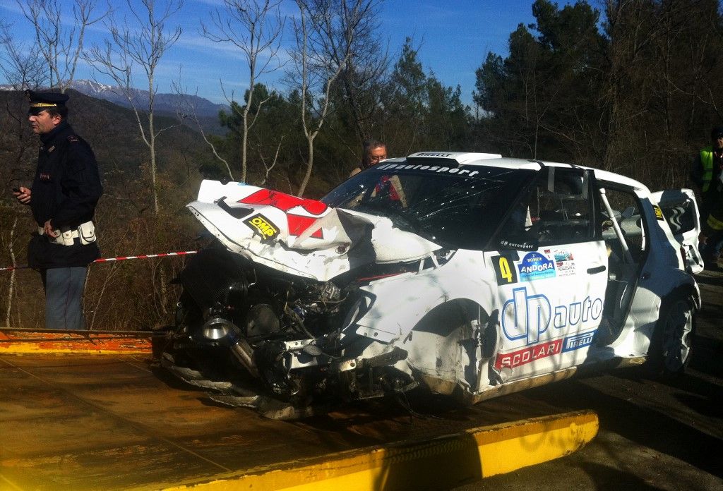 The wrecked car of Formula One driver, Robert Kubica, is loaded onto a tow truck in Andora, on February 6, 2011. The 26-year-old Lotus Renault GP driver from Poland was behind the wheel of the Skoda Fabia during the Ronde di Andora Rally in Liguria in the north-west of Italy, when his vehicle left the road and crashed into a wall. Kubica was undergoing surgery on Sunday after suffering serious multiple injuries. AFP PHOTO / STR (Photo by AFP)