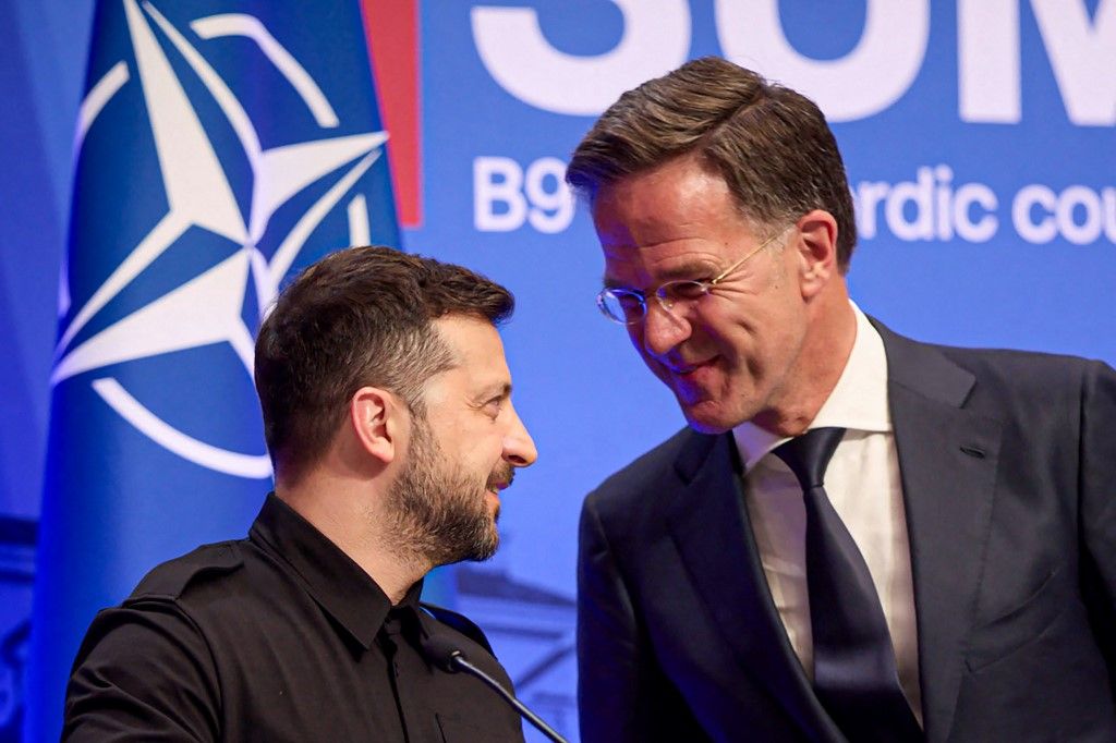 In this handout photograph taken and released by the Ukrainian Presidential Press Service on June 2, 2025, Ukraine's President Volodymyr Zelensky (L) and NATO Secretary General Mark Rutte speak as they take part in a joint press conference on the sidelines of the Vilnius Summit in Vilnius, amid the Russian invasion of Ukraine. (Photo by Handout / UKRAINIAN PRESIDENTIAL PRESS SERVICE / AFP) / RESTRICTED TO EDITORIAL USE - MANDATORY CREDIT "AFP PHOTO / UKRAINIAN PRESIDENTIAL PRESS SERVICE" - NO MARKETING NO ADVERTISING CAMPAIGNS - DISTRIBUTED AS A SERVICE TO CLIENTS