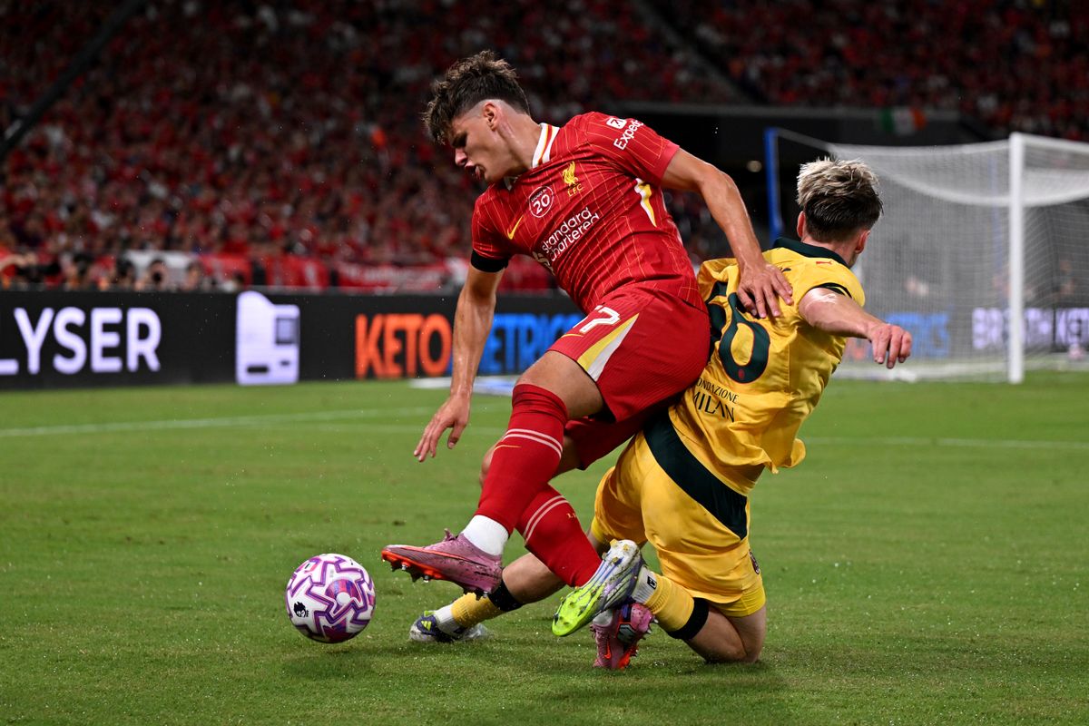 HONG KONG, CHINA - JULY 26: (THE SUN OUT, THE SUN ON SUNDAY OUT) Milos Kerkez of Liverpool is challenged by Alexis Saelemaekers of AC Milan during the Pre-Season Friendly between Liverpool FC and AC Milan at Kai Tak Sports Park on July 26, 2025 in Hong Kong, China. (Photo by Liverpool FC/Liverpool FC via Getty Images)