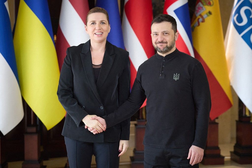 In this handout photograph taken and released by the Ukrainian Presidential Press Service on February 24, 2025, Ukraine's President Volodymyr Zelensky (R) greets Denmark's Prime Minister Mette Frederiksen (L) prior to a meeting with European leaders and Canadian prime minister in Kyiv, to mark the third anniversary of the Russian invasion of Ukraine. (Photo by Handout / UKRAINIAN PRESIDENTIAL PRESS SERVICE / AFP) / RESTRICTED TO EDITORIAL USE - MANDATORY CREDIT "AFP PHOTO / HANDOUT / UKRAINIAN PRESIDENTIAL PRESS SERVICE" - NO MARKETING NO ADVERTISING CAMPAIGNS - DISTRIBUTED AS A SERVICE TO CLIENTS