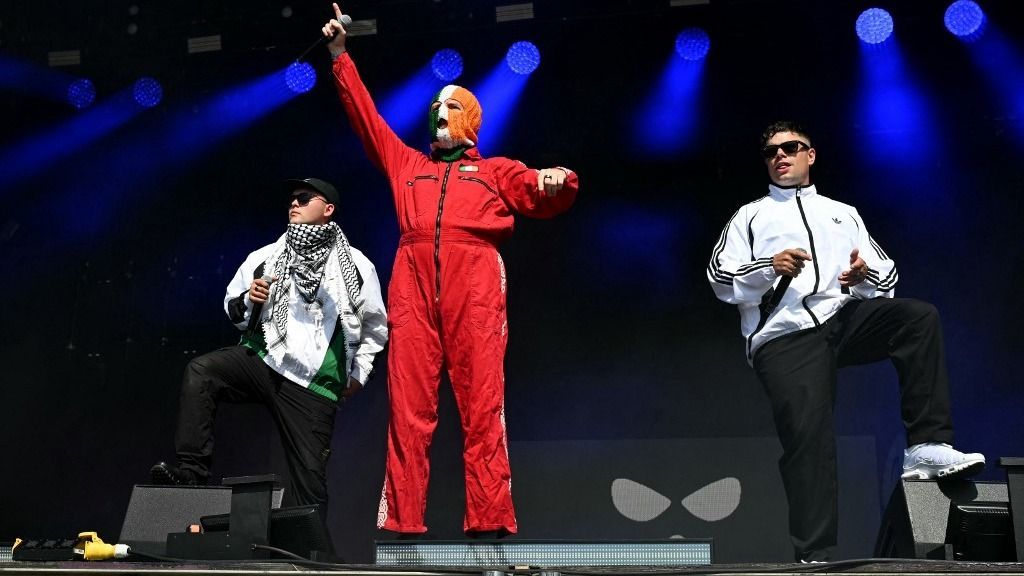 Irish rap band Kneecap perform at the West Holts stage on the fourth day of the Glastonbury festival at Worthy Farm in the village of Pilton in Somerset, south-west England, on June 28, 2025. (Photo by Oli SCARFF / AFP)