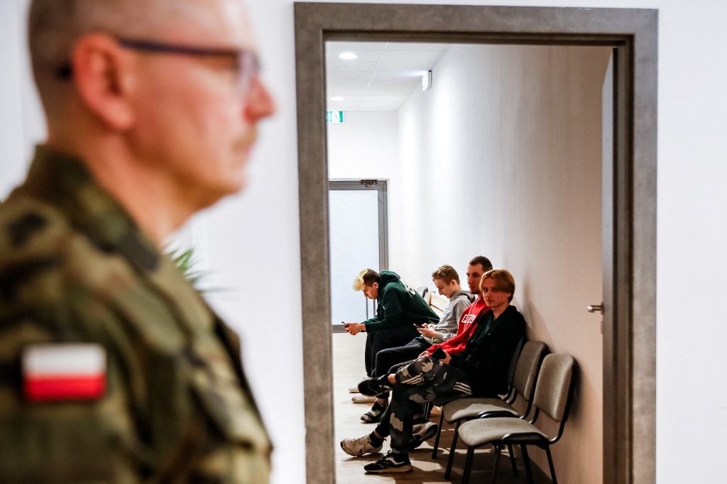 Young men wait in a hall to be seen by a doctor during Myslenice district medical qualification for military service as it starts in all districts of Poland on 1st of February, 2024. Obligatory medical checks register young men and women's ability to serve in the Polish army. This nationwide action will examine 22 thousand young men and women in 2024 and will continue in the future. Poland is the eastern flank country of NATO and the European Union. (Photo by Dominika Zarzycka/NurPhoto) (Photo by Dominika Zarzycka / NurPhoto via AFP)
