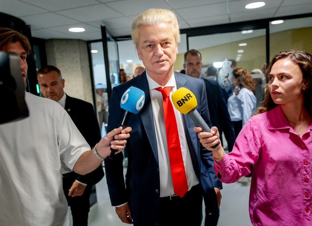 THE HAGUE - Geert Wilders (PVV) after voting in the House of Representatives. Tonight's vote is on the Asylum Emergency Measures Act, the Introduction of Dual Status Act and motions submitted during the debate. ANP REMKO DE WAAL netherlands out - belgium out (Photo by REMKO DE WAAL / ANP MAG / ANP via AFP)